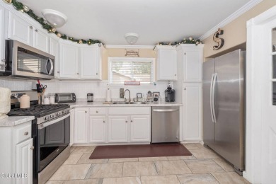 Welcome home to this charming 2-bedroom, 2-bath residence filled on Amsterdam Municipal Golf Course in New York - for sale on GolfHomes.com, golf home, golf lot