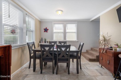 Welcome home to this charming 2-bedroom, 2-bath residence filled on Amsterdam Municipal Golf Course in New York - for sale on GolfHomes.com, golf home, golf lot