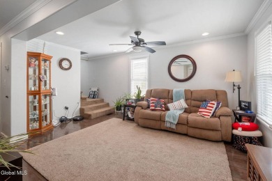 Welcome home to this charming 2-bedroom, 2-bath residence filled on Amsterdam Municipal Golf Course in New York - for sale on GolfHomes.com, golf home, golf lot