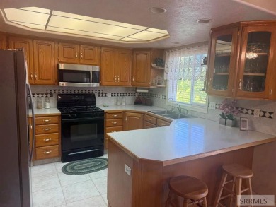 Welcome to your dream Highland home! This charming residence on Highland Golf Course in Idaho - for sale on GolfHomes.com, golf home, golf lot