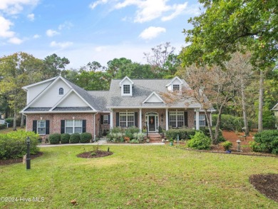 This beautiful home is nestled on a completely landscaped wooded on Lockwood Folly Country Club in North Carolina - for sale on GolfHomes.com, golf home, golf lot