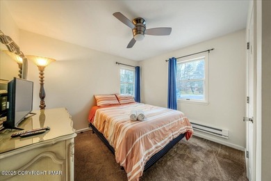 Do not miss this turnkey, fully furnished, and STR-ready in on Pocono Farms Country Club in Pennsylvania - for sale on GolfHomes.com, golf home, golf lot