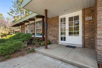Mid-century modern classic, designed by renowned Charlevoix on Charlevoix Golf Club in Michigan - for sale on GolfHomes.com, golf home, golf lot