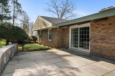 Mid-century modern classic, designed by renowned Charlevoix on Charlevoix Golf Club in Michigan - for sale on GolfHomes.com, golf home, golf lot