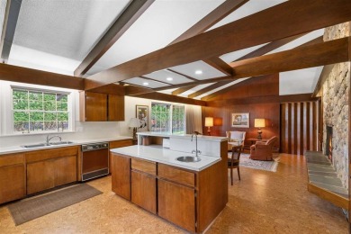Mid-century modern classic, designed by renowned Charlevoix on Charlevoix Golf Club in Michigan - for sale on GolfHomes.com, golf home, golf lot