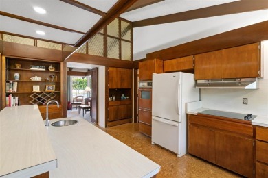 Mid-century modern classic, designed by renowned Charlevoix on Charlevoix Golf Club in Michigan - for sale on GolfHomes.com, golf home, golf lot