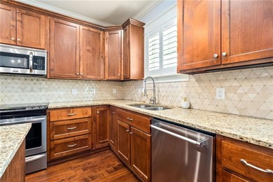 Discover the perfect balance of a serene, low-maintenance home on Grand National Golf Course in Alabama - for sale on GolfHomes.com, golf home, golf lot