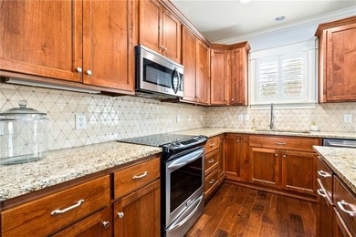 Discover the perfect balance of a serene, low-maintenance home on Grand National Golf Course in Alabama - for sale on GolfHomes.com, golf home, golf lot