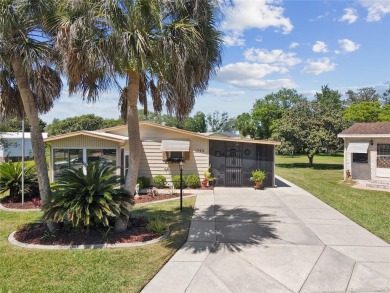 Welcome to this lovely 2 spacious bedrooms that offers ample on Hill Top Executive Golf Course in Florida - for sale on GolfHomes.com, golf home, golf lot