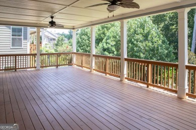 Tucked away on a wooded lot in Cresswind at Lake Lanier, a on Lanier Island Legacy Golf Couorse in Georgia - for sale on GolfHomes.com, golf home, golf lot