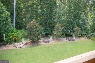 Tucked away on a wooded lot in Cresswind at Lake Lanier, a on Lanier Island Legacy Golf Couorse in Georgia - for sale on GolfHomes.com, golf home, golf lot