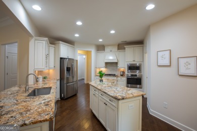 Tucked away on a wooded lot in Cresswind at Lake Lanier, a on Lanier Island Legacy Golf Couorse in Georgia - for sale on GolfHomes.com, golf home, golf lot