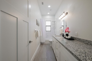 Elegant newer-construction pool home in gated Country Club on St. Lucie Trail Golf Club in Florida - for sale on GolfHomes.com, golf home, golf lot