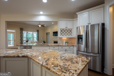 Tucked away on a wooded lot in Cresswind at Lake Lanier, a on Lanier Island Legacy Golf Couorse in Georgia - for sale on GolfHomes.com, golf home, golf lot