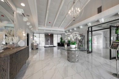 Elegant newer-construction pool home in gated Country Club on St. Lucie Trail Golf Club in Florida - for sale on GolfHomes.com, golf home, golf lot