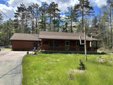 Charming 2 bedroom, 2 bath, 1,120 sq ft ranch home nestled on 3 on Garland Resort and Golf Club  in Michigan - for sale on GolfHomes.com, golf home, golf lot