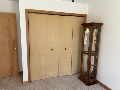 Charming 2 bedroom, 2 bath, 1,120 sq ft ranch home nestled on 3 on Garland Resort and Golf Club  in Michigan - for sale on GolfHomes.com, golf home, golf lot