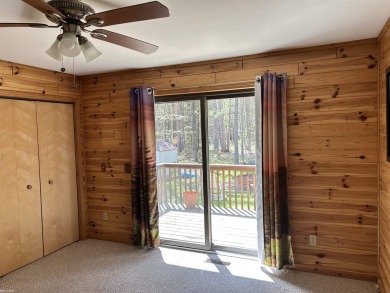 Charming 2 bedroom, 2 bath, 1,120 sq ft ranch home nestled on 3 on Garland Resort and Golf Club  in Michigan - for sale on GolfHomes.com, golf home, golf lot