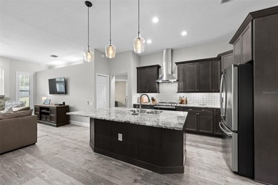 Step into this meticulously upgraded 3-bedroom, 2-bathroom gem on Silverthorn Country Club in Florida - for sale on GolfHomes.com, golf home, golf lot