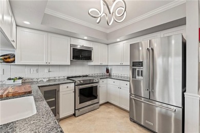 Charming, stately, end-unit with a spectacular view of the on The Forest Country Club in Florida - for sale on GolfHomes.com, golf home, golf lot