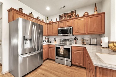 Enjoy breathtaking panoramic golf course views from this on Ledgestone Country Club and Golf Course in Missouri - for sale on GolfHomes.com, golf home, golf lot