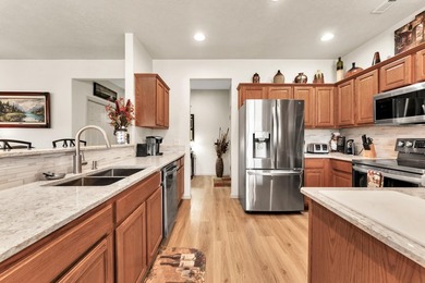 Enjoy breathtaking panoramic golf course views from this on Ledgestone Country Club and Golf Course in Missouri - for sale on GolfHomes.com, golf home, golf lot