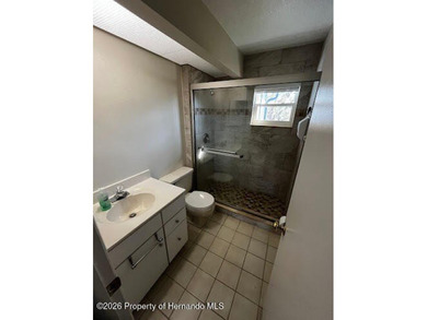 Don't miss this Beautiful 2nd floor condo overlooking the on Heather Golf and Country Club in Florida - for sale on GolfHomes.com, golf home, golf lot