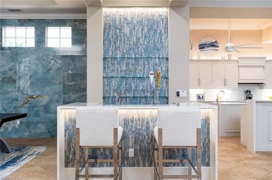 Discover elevated coastal living in this stunning second-floor on Miromar Lakes Golf Club in Florida - for sale on GolfHomes.com, golf home, golf lot