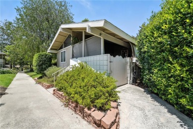 This charming La Corona unit offers approximately 850 square on Laguna Woods Village Golf Course in California - for sale on GolfHomes.com, golf home, golf lot