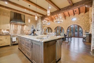 Nestled within the highly exclusive Escondido Golf & Lake Club on Escondido Golf and Lake Club  in Texas - for sale on GolfHomes.com, golf home, golf lot