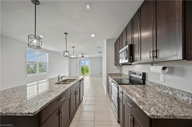 Entertain guests with ease in the open kitchen, dining, and on Babcock National Golf Course in Florida - for sale on GolfHomes.com, golf home, golf lot