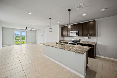 Entertain guests with ease in the open kitchen, dining, and on Babcock National Golf Course in Florida - for sale on GolfHomes.com, golf home, golf lot