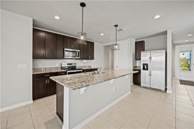 Entertain guests with ease in the open kitchen, dining, and on Babcock National Golf Course in Florida - for sale on GolfHomes.com, golf home, golf lot