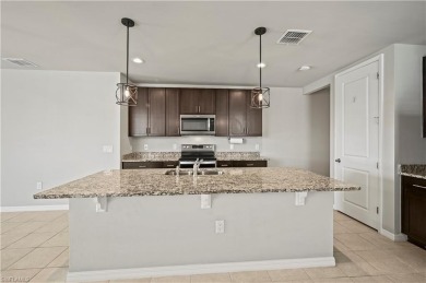 Entertain guests with ease in the open kitchen, dining, and on Babcock National Golf Course in Florida - for sale on GolfHomes.com, golf home, golf lot