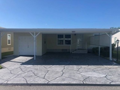 CYPRESS CREEK VILLAGE #297 - 2BED / 2 BATH / 1,200 SF. / $136 on Cypresswood Golf and Country Club in Florida - for sale on GolfHomes.com, golf home, golf lot