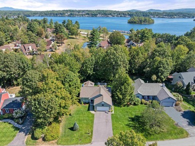 Nestled in the sought after gated waterfront community of South on Laconia Country Club in New Hampshire - for sale on GolfHomes.com, golf home, golf lot