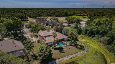 Welcome to this beautifully appointed 5-bedroom, 4-bathroom on Wentworth Golf Club in Florida - for sale on GolfHomes.com, golf home, golf lot