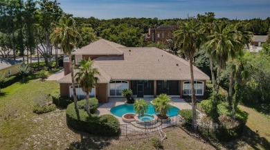 Welcome to this beautifully appointed 5-bedroom, 4-bathroom on Wentworth Golf Club in Florida - for sale on GolfHomes.com, golf home, golf lot