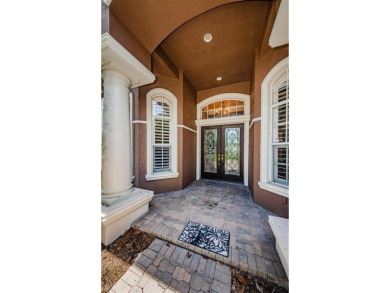 Welcome to this beautifully appointed 5-bedroom, 4-bathroom on Wentworth Golf Club in Florida - for sale on GolfHomes.com, golf home, golf lot