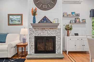 Nestled in the sought after gated waterfront community of South on Laconia Country Club in New Hampshire - for sale on GolfHomes.com, golf home, golf lot