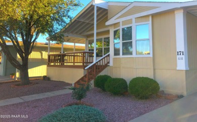 Fabulous home at a fabulous price! Long time owners have taken on Quail Wood Greens Golf Course in Arizona - for sale on GolfHomes.com, golf home, golf lot