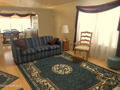 Fabulous home at a fabulous price! Long time owners have taken on Quail Wood Greens Golf Course in Arizona - for sale on GolfHomes.com, golf home, golf lot