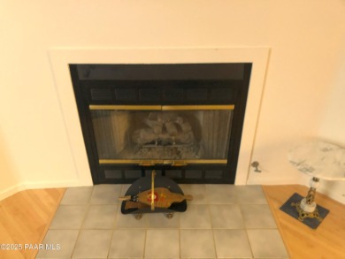 Fabulous home at a fabulous price! Long time owners have taken on Quail Wood Greens Golf Course in Arizona - for sale on GolfHomes.com, golf home, golf lot