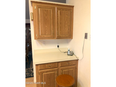 Fabulous home at a fabulous price! Long time owners have taken on Quail Wood Greens Golf Course in Arizona - for sale on GolfHomes.com, golf home, golf lot