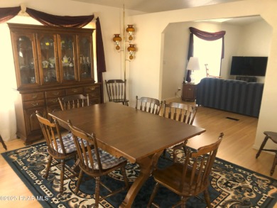 Fabulous home at a fabulous price! Long time owners have taken on Quail Wood Greens Golf Course in Arizona - for sale on GolfHomes.com, golf home, golf lot