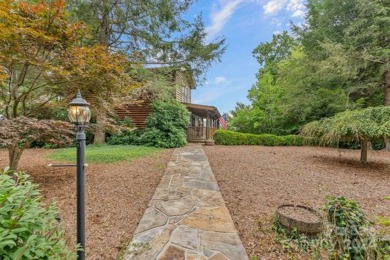 Nestled in the gated community of The Sanctuary at the base of on Mt. Mitchell Golf Course in North Carolina - for sale on GolfHomes.com, golf home, golf lot