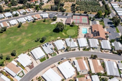 Awesome location on the lake and the golf course for this on Highland Springs Village Golf Course in California - for sale on GolfHomes.com, golf home, golf lot
