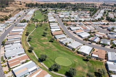 Awesome location on the lake and the golf course for this on Highland Springs Village Golf Course in California - for sale on GolfHomes.com, golf home, golf lot