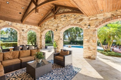 Welcome to this grand residence nestled on a sprawling 1.17 acre on Isleworth Golf and Country Club in Florida - for sale on GolfHomes.com, golf home, golf lot