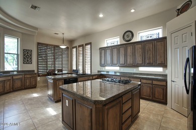 Hacienda-style living at its best! This stunning Legend Trail on Legend Trail Golf Club in Arizona - for sale on GolfHomes.com, golf home, golf lot